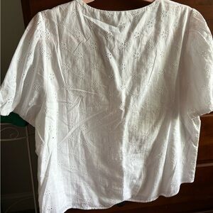 Never worn J Crew white eyelet blouse.